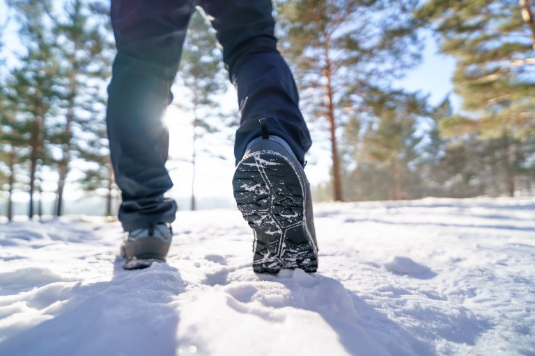 A person walking in snow.