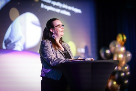 Susanna Bairoh giving her keynote speech at NWiTA 2025.